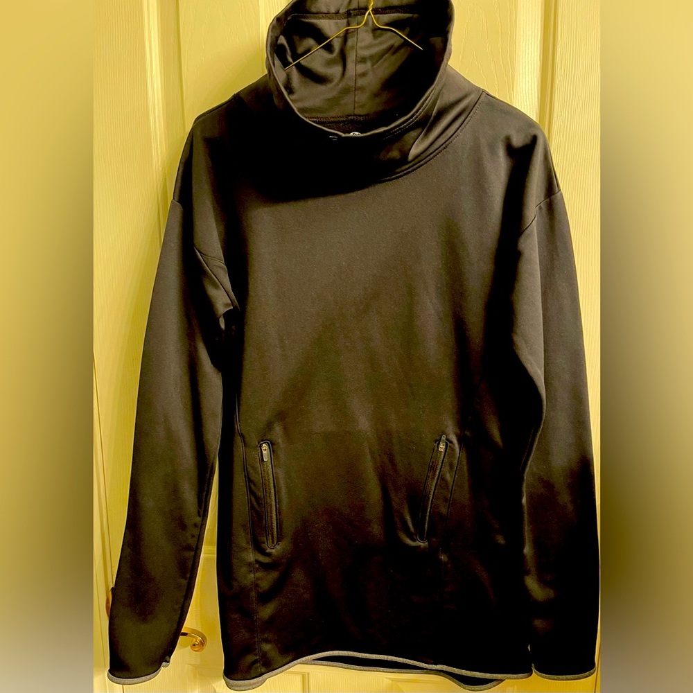 Black pullover active ware.perfect for cool days walking or running). Slim look!